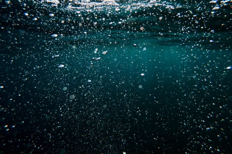 Air bubbles rising in a liquid.